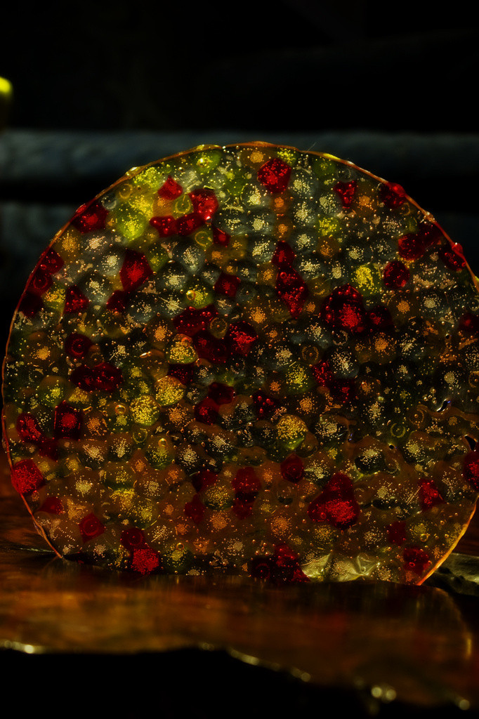 Suncatcher disk made from melted plastic beads