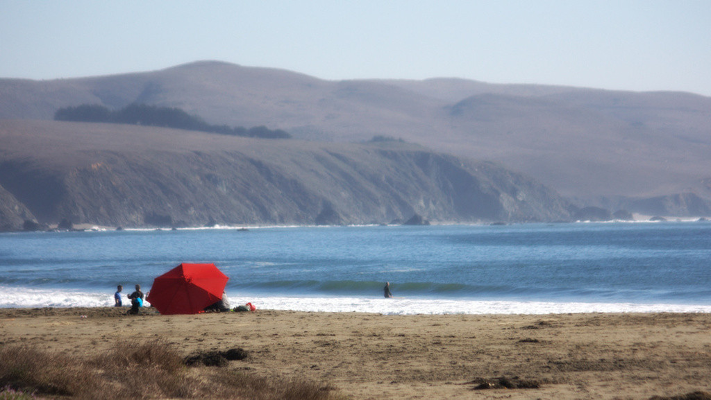 Red umbrella at the beach