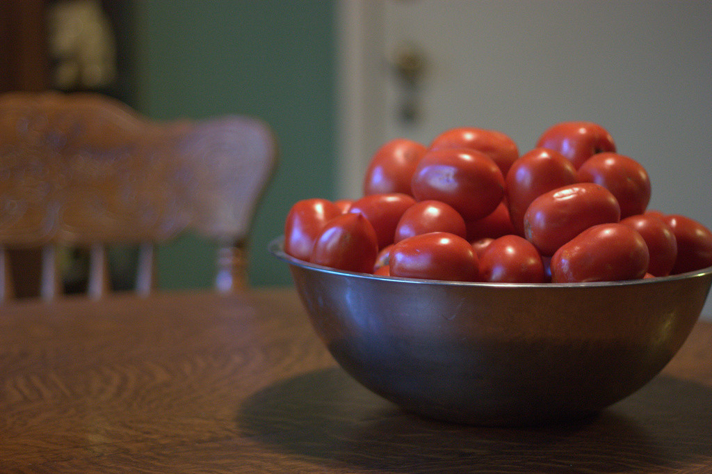 Bowl full of roma tomatoes